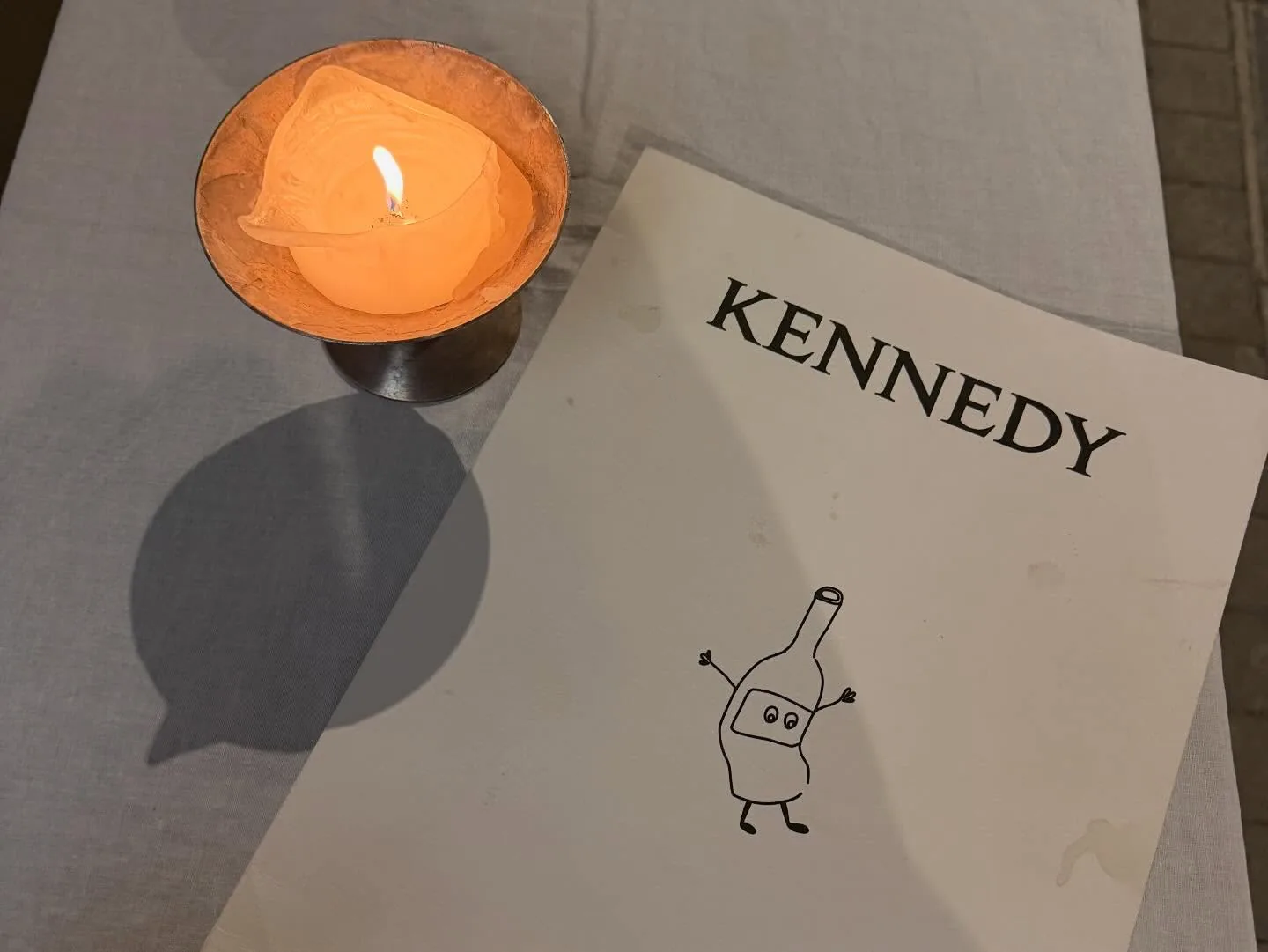 A candle and the Kennedy menu, Athens